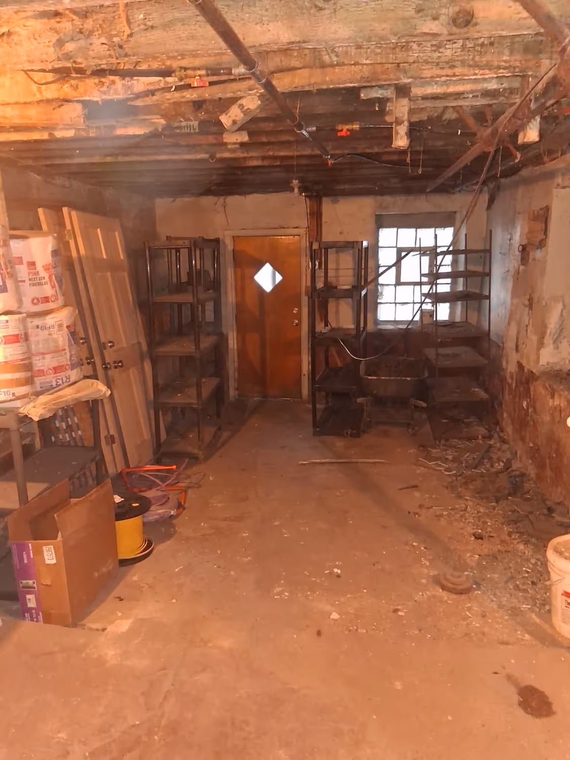 A gutted, fire-damaged interior at our Parkview project before renovation